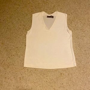 Chicos size 2 off white sleeveless jersey. Never worn 95% acetate